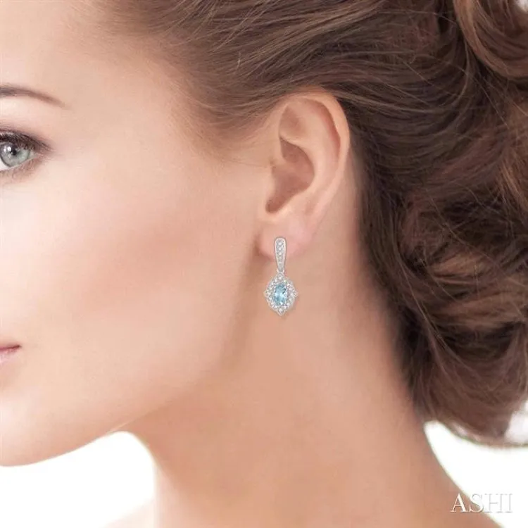 5x3 MM Oval Shape Aquamarine and 1/4 ctw Round Cut Diamond Semi Precious Earrings in 10K White Gold